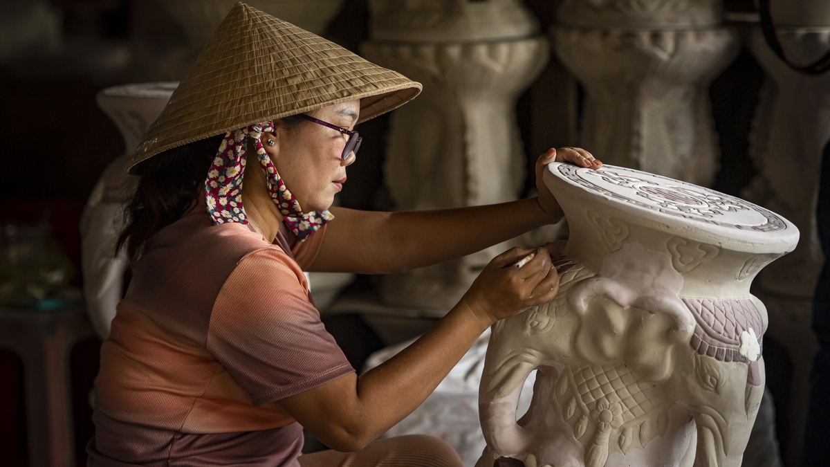 Người thợ chấm men 