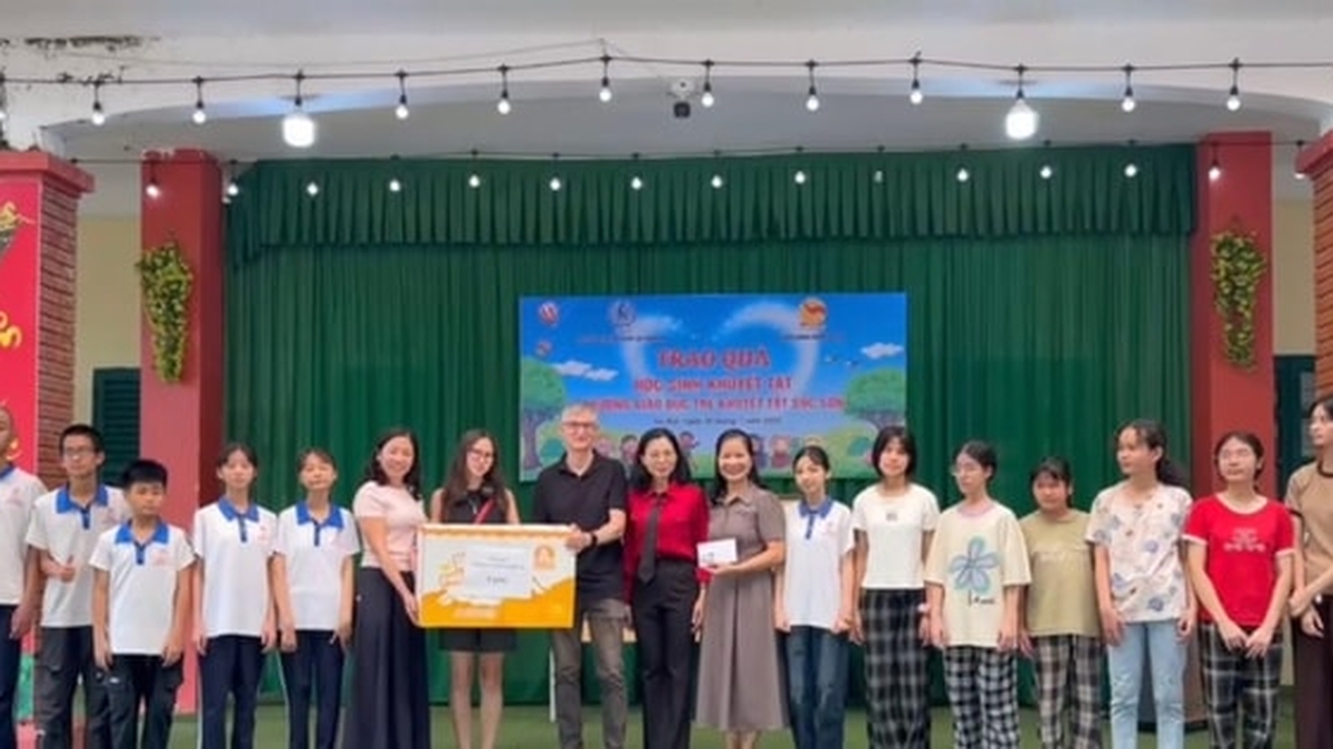 Giving gifts to children at Soc Son School for Disabled Children