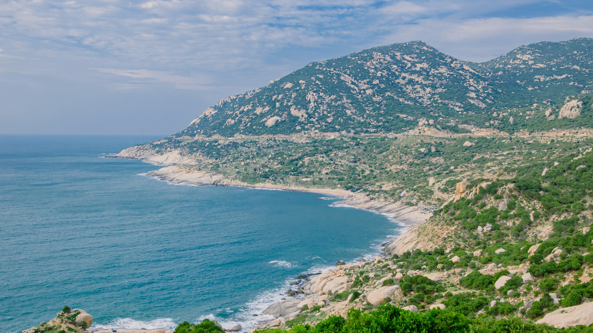 The pristine beach in the Central region is located along the national highway, with peaceful scenery.