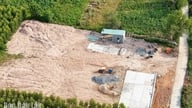 In der Gemeinde Suoi Trai sind zahlreiche Wiegestationen für landwirtschaftliche Produkte spontan entstanden.