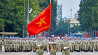 Da de grønne baretsoldater vendte tilbage fra Afrika, rapporterede de om deres præstationer til præsident Ho Chi Minh.