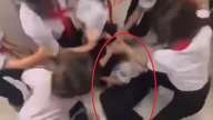 A video showing a female student being attacked by a group of classmates in a school restroom in Ho Chi Minh City has caused a stir.