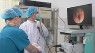 Two dentures were lost for unknown reasons, and 20 years later they were found lodged in the lungs.