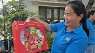 Ho Chi Minh şehrinde temizlik işçileri için erken bir Tet kutlaması.