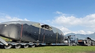 Pesawat C-119 'flying wagon' telah dibawa ke bandara Ta Con dan dipamerkan bersama pesawat C-130 'workhorse'-nya.