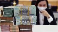 Sejumlah bank melaporkan keuntungan melebihi 30 triliun VND.