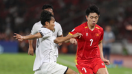 Træner Kim Sang-sik, Dinh Bac og U22-holdet i Vietnam modtog gode nyheder, og ministeren overrakte en overraskelsesgave.