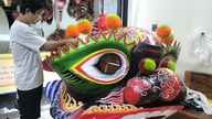 Os últimos artesãos remanescentes: O único que fabrica a cabeça de cachorro celestial em Hoi An.