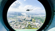 Nyd den smukke udsigt over Ho Chi Minh City fra en helikopter.