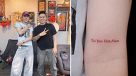 Thailandsk turist får tatoveret ordene 'Jeg elsker Vietnam'.