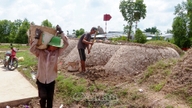 Humane levebrød under Qingming-festivalen ved besøg på grave.