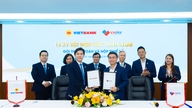 Cerimônia de assinatura do acordo de cooperação para implementar uma solução abrangente de pagamento digital e pagamento de impostos entre o Vietbank e o VNPAY.