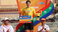 O "especialista em velocidade" Marchuk Dzianis mantém as camisas amarela e verde da Copa da Televisão da Cidade de Ho Chi Minh.