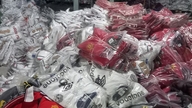 Tien Tri Group verkoopt duizenden modeartikelen met namaaklogo's van Nike, Adidas, Puma, Jordan en Manchester United.