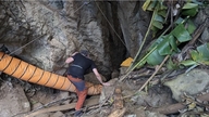 Laos lyckades rädda fyra personer som varit instängda i en översvämmad grotta i tio dagar.