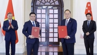 Vietnã - Singapura: Promovendo a cooperação nas áreas de economia, comércio, indústria e energia.