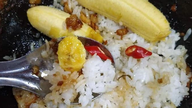 Eating rice with fruit: A delicious treat or a result of a healthy work habit?