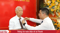 Presenting the 80-Year Party Membership Badge to Party member Van Nhu Tuoc