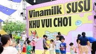 Vinamilk og børn nyder en sommerfestival på Phu My Hung.