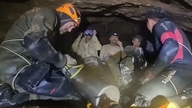 Спасательные команды временно приостановили поиски двух человек, пропавших без вести в затопленной пещере в Лаосе.