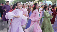 Ho Chi Minh City: Mass parade of Ao Dai (traditional Vietnamese dress) across the city on March 8th.