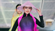 Thay vì kiện vi phạm bản quyền, Trung Đinh cho phép in lại áo dài để bán giá phổ thông