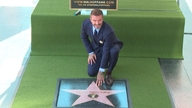 David Beckham hedrades med en stjärna på Hollywood Walk of Fame.