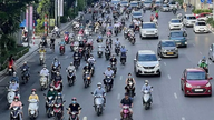 Hanoi biedt steun tot 20 miljoen VND aan arme huishoudens om over te stappen op milieuvriendelijke voertuigen.