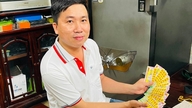 CLIP: Lottery prize redemption agents work through the night for Southern Vietnam lottery winners.