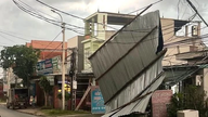 Thunderstorms and strong winds ripped off roofs and blew away advertising signs in Phu Tho province.