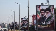 AS untuk sementara menangguhkan sanksi minyak, dan Iran membuka pintunya bagi inspektur nuklir.