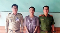 Authorities have arrested two wanted fugitives hiding in Cambodia.