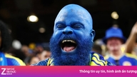 De identiteit van de fan met het blauwe gezicht die voor opschudding zorgde tijdens het WK is bekendgemaakt.