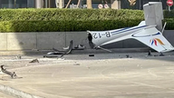 Un avion s'écrase sur le plus haut bâtiment de Pékin ; le pilote est tué.