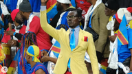 Kongolesisk supporter "förvandlade sig till en staty" och nekades inresa till USA.