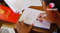 Autoridade para reconhecer terrenos residenciais e emitir títulos de propriedade para terrenos adquiridos com documentos manuscritos.