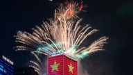 Fyrverkerier lyste upp himlen över Ho Chi Minh-staden för att fira 50-årsdagen av att staden uppkallades efter president Ho Chi Minh.