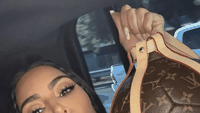 Kim Kardashian khoe bóng Louis Vuitton hiếm từ World Cup 1998 trong dự án UNICEF