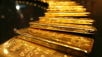Vàng chịu áp lực bán khi đồng USD mạnh lên