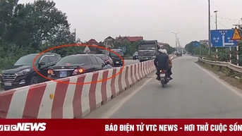 Xe biển xanh chạy ngược chiều trên quốc lộ 38 của UBND thị xã Thuận Thành