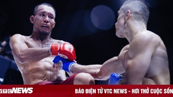 Tran Quang Loc វាយ​ឈ្នះ​អ្នក​ប្រដាល់​វៀតណាម-អាមេរិក​ដើម្បី​ការពារ​ខ្សែក្រវាត់​ជើងឯក។