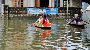 Mưa tiếp diễn tại Hà Nội, vùng ven sông Bùi còn ngập 4