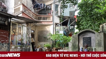 Nhà người sống chen với mộ người chết ngay giữa 'tấc đất tấc vàng' Hà Nội