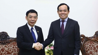 Tran Luu Quang 부총리는 라오스 내무부 장관을 접견했습니다.