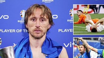 Khuôn mặt đau khổ của Luka Modric khi nhận giải cá nhân