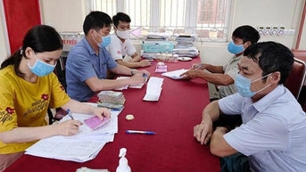 Hà Nội chi trả an sinh xã hội không dùng tiền mặt, đem lại lợi ích tối đa cho người dân