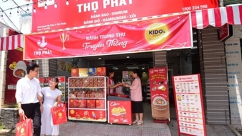 ការប្រណាំងក្នុងឧស្សាហកម្មនំព្រះខែរវាង KIDO និង Mondelez Kinh Do