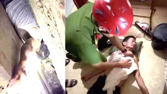 Giải cứu người đàn ông mắc kẹt giữa khe tường hai nhà