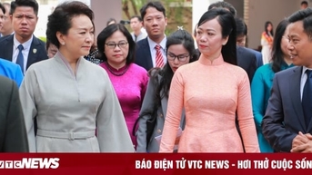베트남과 중국 대통령 부인 두 명이 하노이 국립대학교를 방문했습니다.