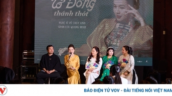 Vu Thuy Linh "ពាក់អាវថ្មី" សម្រាប់បទចម្រៀងប្រជាប្រិយនៅពេលរួមបញ្ចូលគ្នាជាមួយតន្ត្រី symphony ។